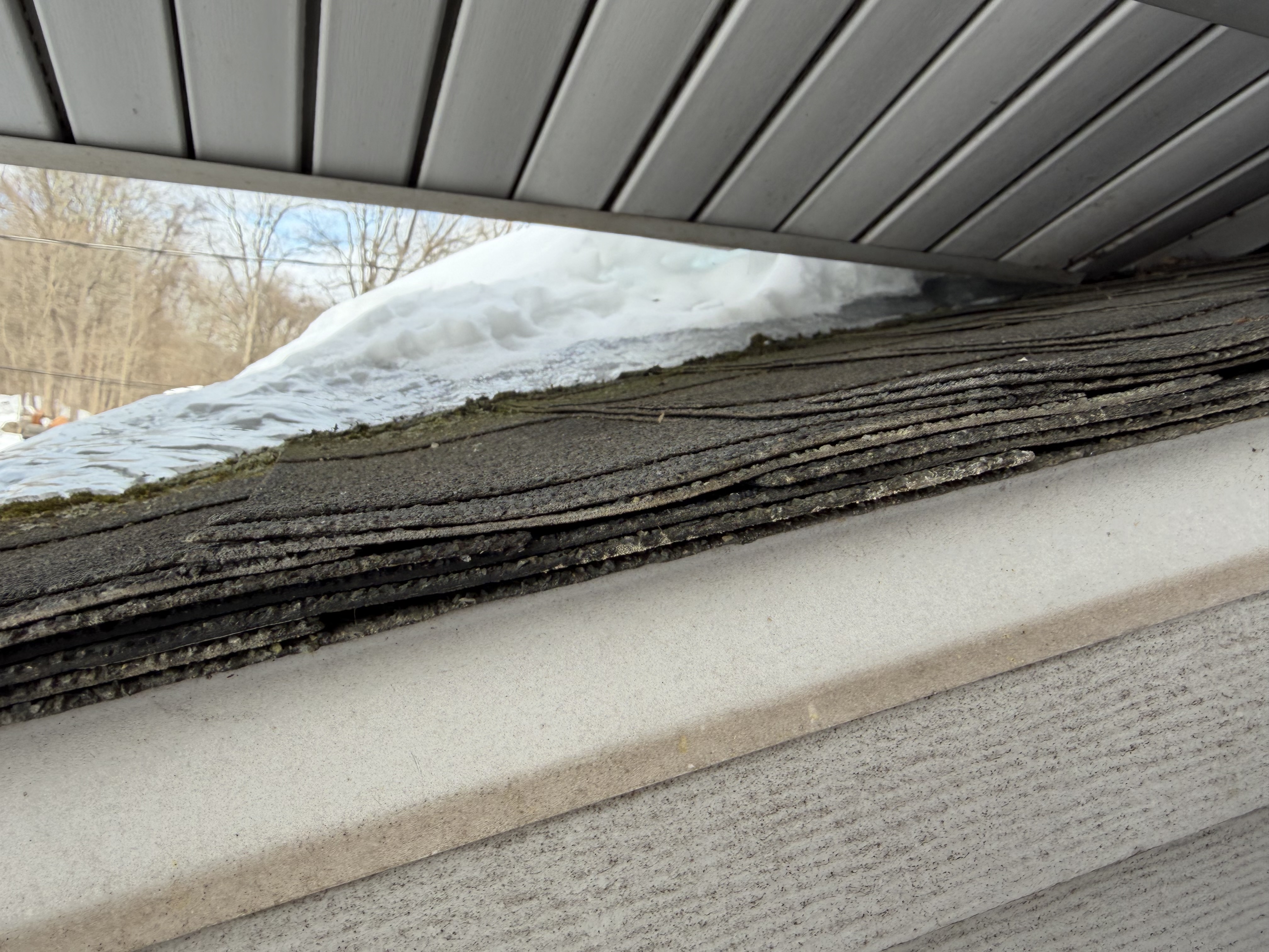 Multiple shingle layers at eave
